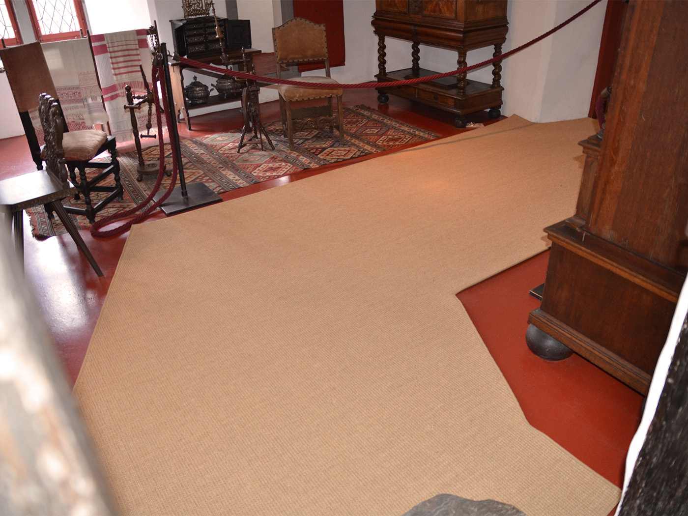 Photo of a coconut runner sewn to fit the hallway.