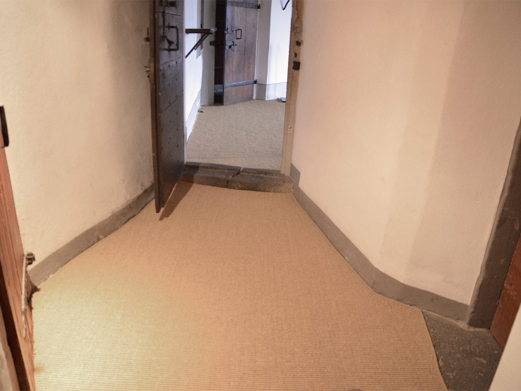 Photo of a coconut runner made to fit a narrowing passage.