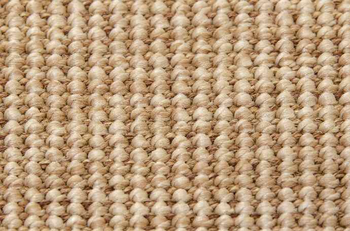 Close up photo of an outdoor carpet Taffino Rips color nature.