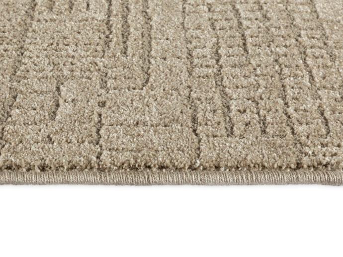 Tredtio Sand Foto der gekettelten Kante des Teppichs Tredito in Farbe Sand.